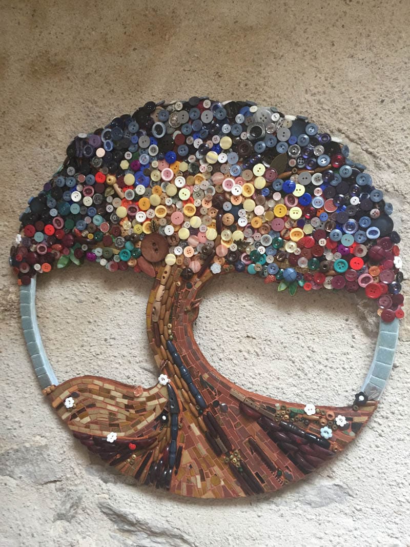 indoor wall art with mosaic and buttons