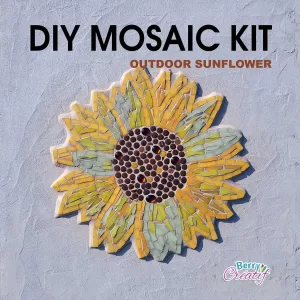sunflower mosaic kit installed on a stone coloured wall