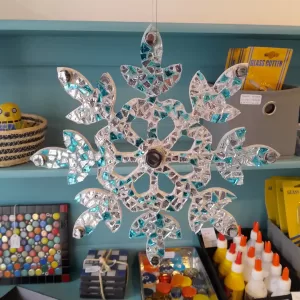 hanging snowflake decoration with mirror and blue sparkles
